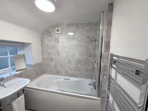 Bathroom with bath & shower