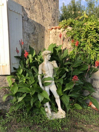 Larry is at the gate to welcome you into the Garden