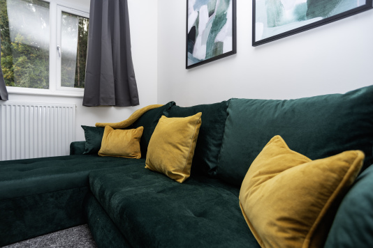 Close-up of our stylish, comfortable sofa bed - fully dressed and ready to offer extra flexible sleeping space.