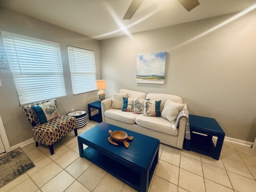 Living room has full sleeper sofa