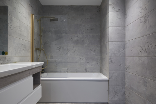 Relax and refresh in this clean and stylish bathroom space.