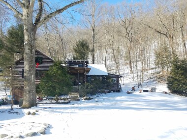 View of the front of the home during winter snow