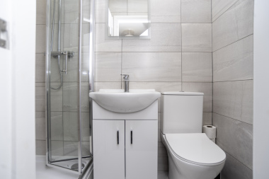 Modern ensuite with walk-in shower and complimentary toiletries