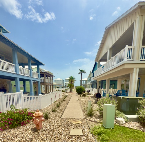 Beach access is through this sidewalK to the boardwalk