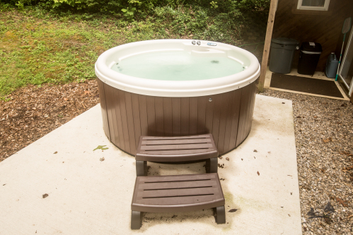 Hot tub behind Cottage