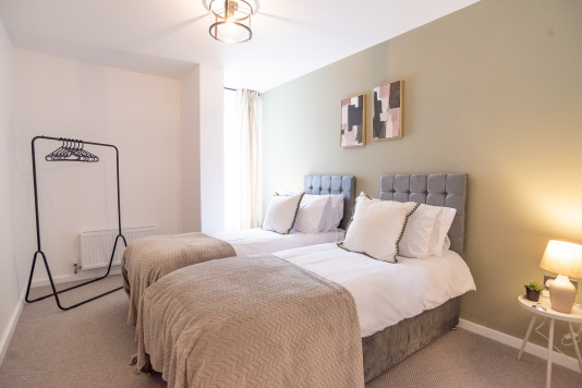 Zip-and-link beds arranged as twins for flexible sleeping.