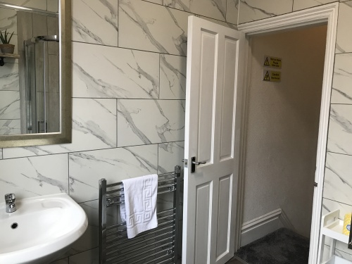 Modern private bathroom with Towel Radiator