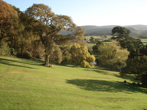 Garden view from the house, large lawn and the moorland behind