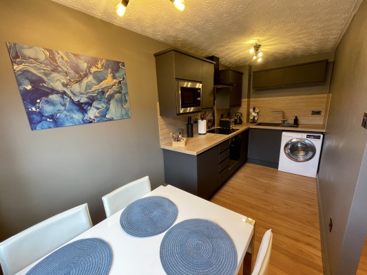 Newly fitted kitchen with dining area