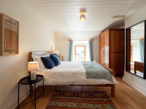 Bedroom 2 with a king double bed and a single bed