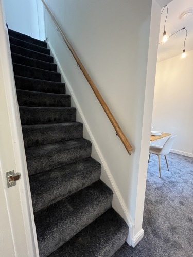 Stairs leading up to the bedrooms