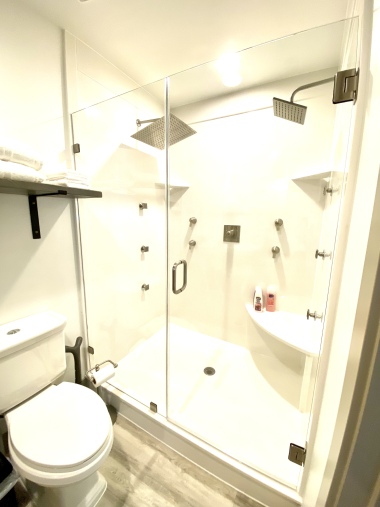 bathroom with walk in shower. 