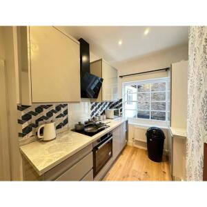 This photo represents the kitchen of the flat. 