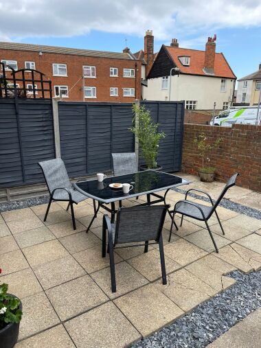Spacious area for eating outside, or relaxing with a coffee or glass of wine!