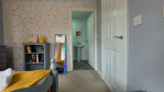 A bedroom that anticipates your needs. Private bathroom? Check. Good books? Check. Plenty of space? Check.