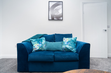 Sofa bed fully dressed with fresh, hotel-quality linens - ready to use and perfect for flexible extra sleeping space.