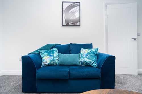 Sofa bed fully dressed with fresh, hotel-quality linens - ready to use and perfect for flexible extra sleeping space.