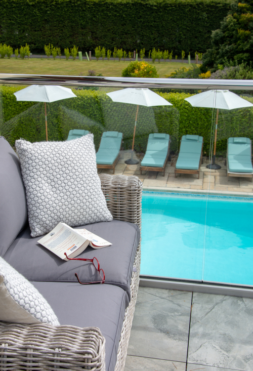 Balcony overlooking the pool and hot tub