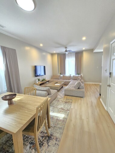 Enjoy another angle of this inviting space, featuring chic artwork, a 55