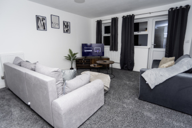 Family-friendly lounge with Smart TV and flexible sleeping space