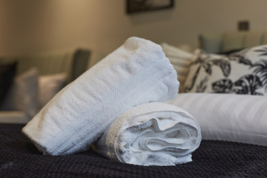 A warm and inviting double bedroom designed with your comfort in mind.