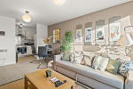 Spacious open-plan living area seamlessly connected to the modern kitchen for a comfortable stay.