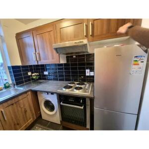 This photo represent the kitchen of the property. 