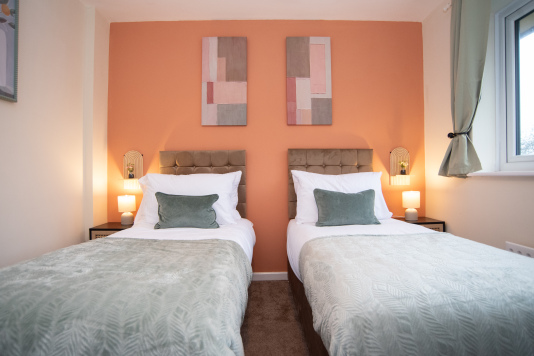 Three generously sized bedrooms with king-size zip-link beds, offering flexible sleeping arrangements to suit your needs.