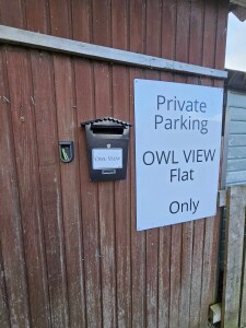 Parking sign and key code box