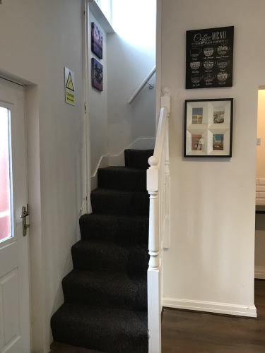 Access to upstairs for bedrooms and bathroom - Please note steep stairs typical of northern townhouses.