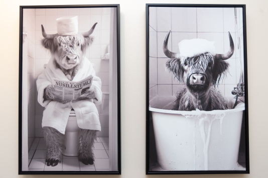 Tasteful artwork throughout the home creates tranquil, relaxing spaces with thoughtfully chosen décor.