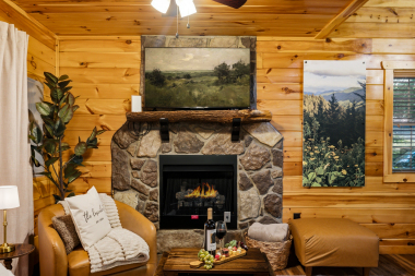 a cozy living room inspired by the calm of the smokies — firelit, connected, and ready for memories.