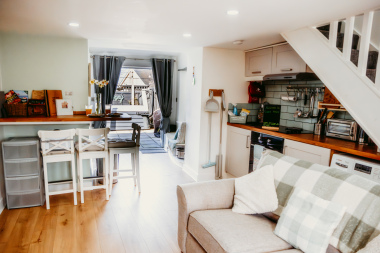 main seating area, dining area and kitchen 