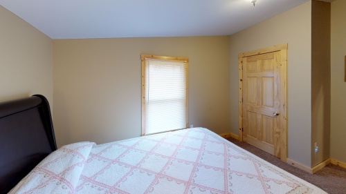 Bedroom 2 comfortably accommodates 2  guests in its Queen sized bed. 