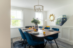 Stylish dining room with large dining table