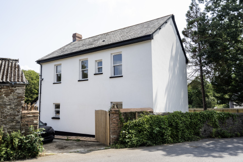 Private Driveway Parking - Gated access with space for two to three cars, perfect for families and contractors