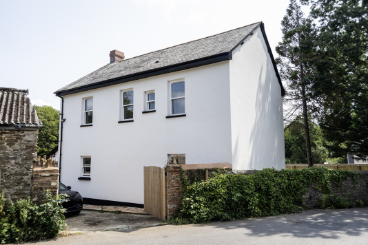 Private Driveway Parking - Gated access with space for two to three cars, perfect for families and contractors