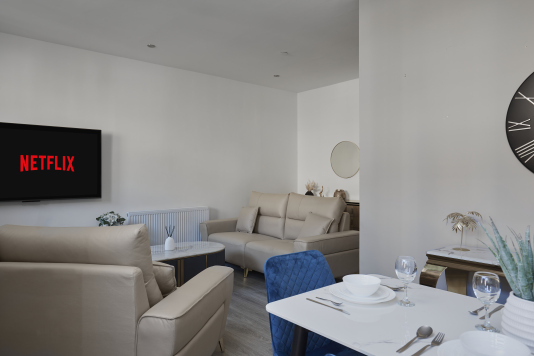 Spacious living room ideal for lounging, socialising, or enjoying a quiet evening.