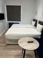 Apt.20Living space with 2 single beds
