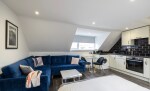 Aquila Studio Flat: Seating & Kitchen