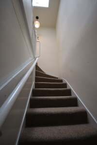 Inside stairs to own entrance door