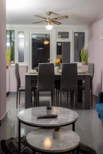 Dining area for 8 guests with brand new dining table chair set and crockery sets