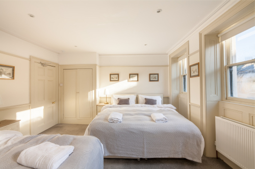 Bedroom 3: 2 Super Kings or 4 singles beds. Each bed has pocket sprung mattresses which are dressed in Egyptian cotton linen. Perfect for families or friends