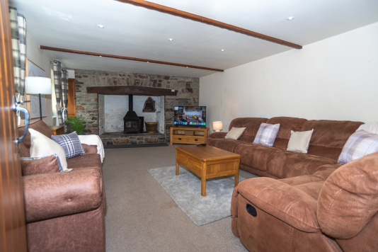 Sink into the sofas after a day exploring Devon, wood burner crackling and Netflix queued up