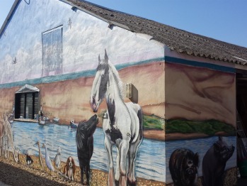 A mural of our pets painted on the barn