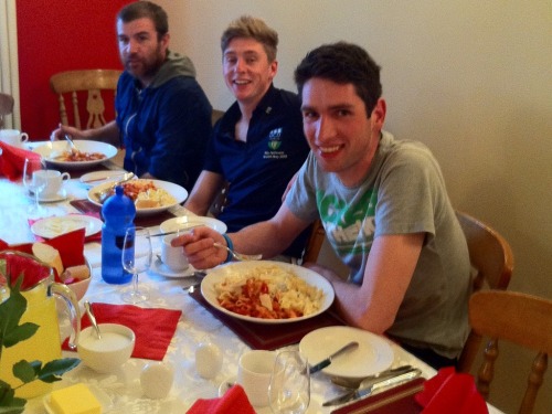 Cyclists enjoying relaxing dinner after Tour of Ulster