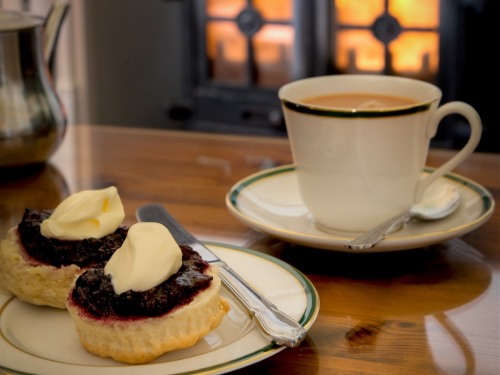 A home made traditional cream tea served in the lounge with the wood burner