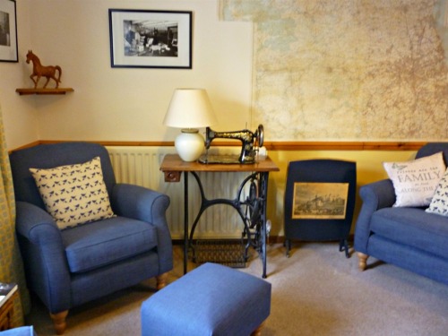 B&B lounge with large scale local map on wall