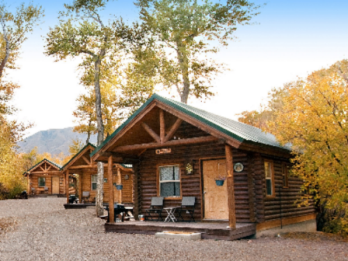 Cabins are all the same except decor.  Two queen beds (one private room) other in main room with kitchenette, Dining Area, TV, Heat and A/C.  Outside: Private Porch, Propane BBQ, Picnic Table.