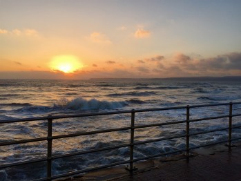 Even a stormy sunrise is a beautiful one, at the Channel View Hotel